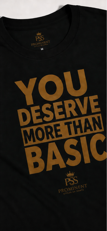  Black You Deserve More Than Basic statement T-shirt with bronze typography and a size 'M'.