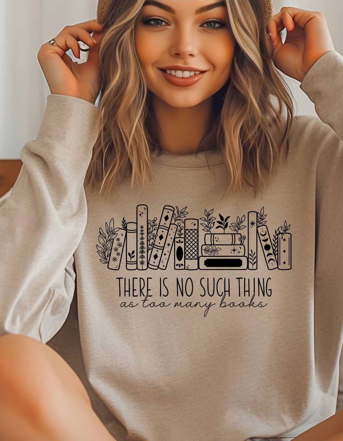 Tan sweater mockup featuring image on front books and floral arrangements words there is no such thing as too many books