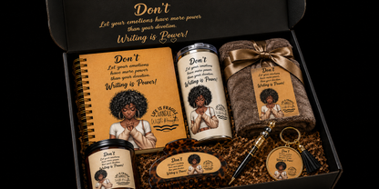 A curated gift box set containing a notebook, tumbler, jar, mug, and small accessories, all coordinated with matching labels and a brown ribbon, set against a black background.