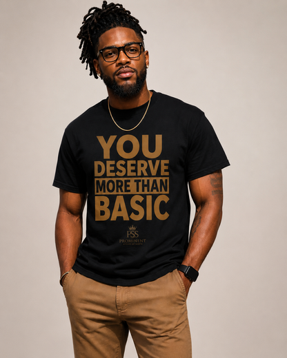 Black male model wearing You Deserve More Than Basic black statement T-shirt by Prominent Styles of Sorts